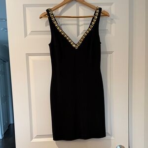 Chic Black Mini Dress with Gold Detailing